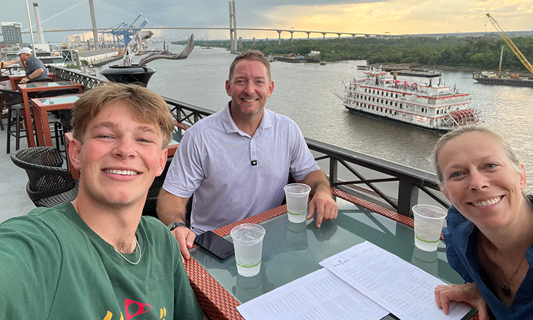 Carter Quartararo, left, and his parents, Tony and Stacie Quartararo, gather during a family trip to Savannah, Georgia, last summer. The Cal Poly industrial engineering senior said food and travel have long shaped the way he experiences a place.