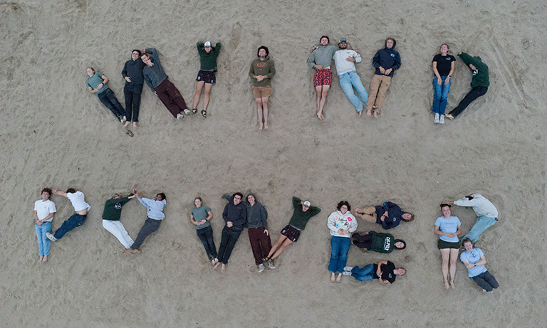 Cal Poly Wind Power members spell out the club’s name, reflecting the team culture behind its first overall win at the 2026 Collegiate Wind Competition Western Regional.