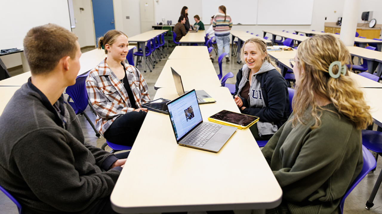 Students collaborate in a College of Engineering classroom. New faculty scholars Puneet Agarwal and Jiun-Yao Cheng will help guide the responsible integration of artificial intelligence across the college’s programs.