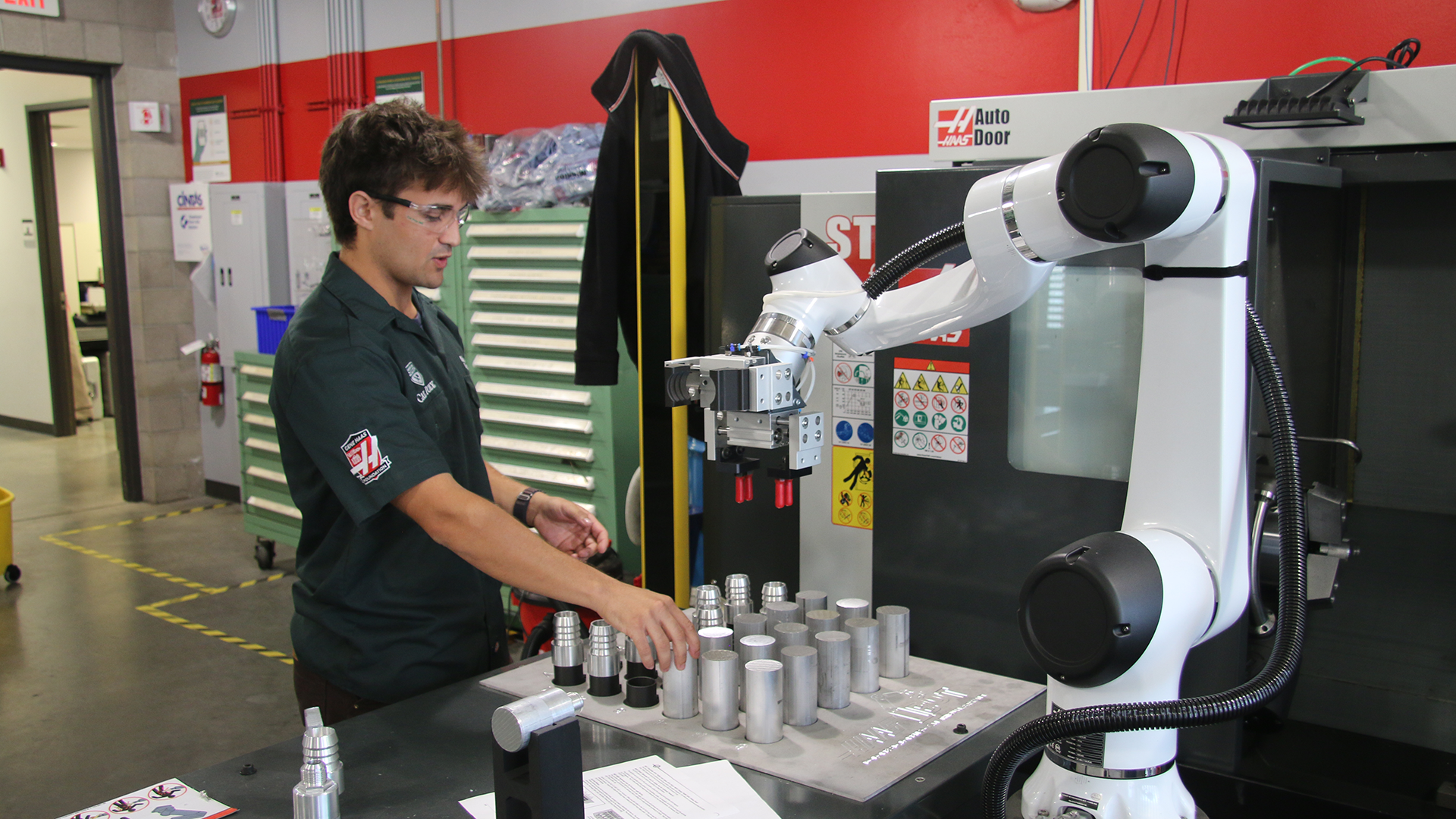 Lab tech explains the function of a machine
