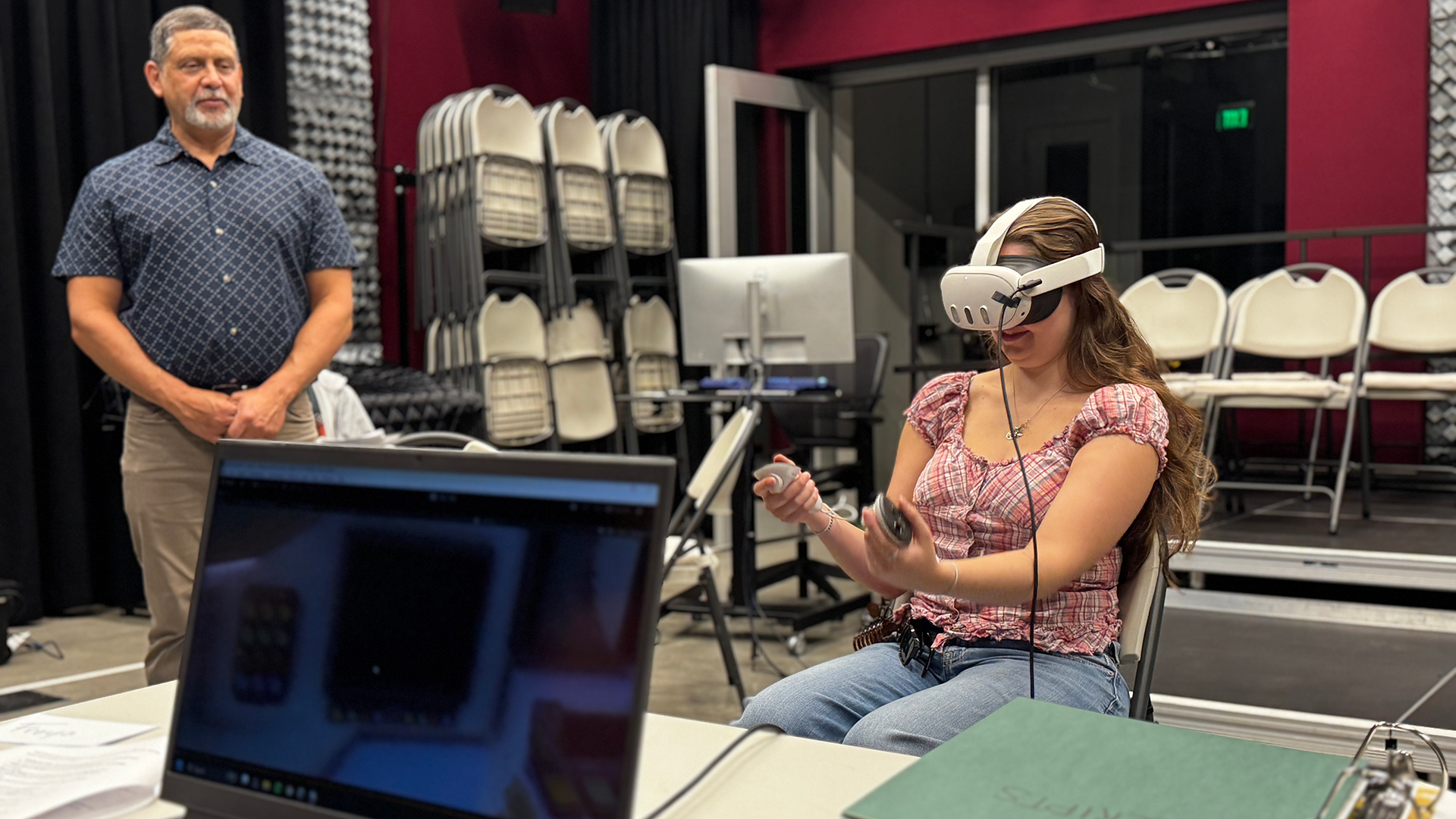 Student playtests the VR program in a lab on campus