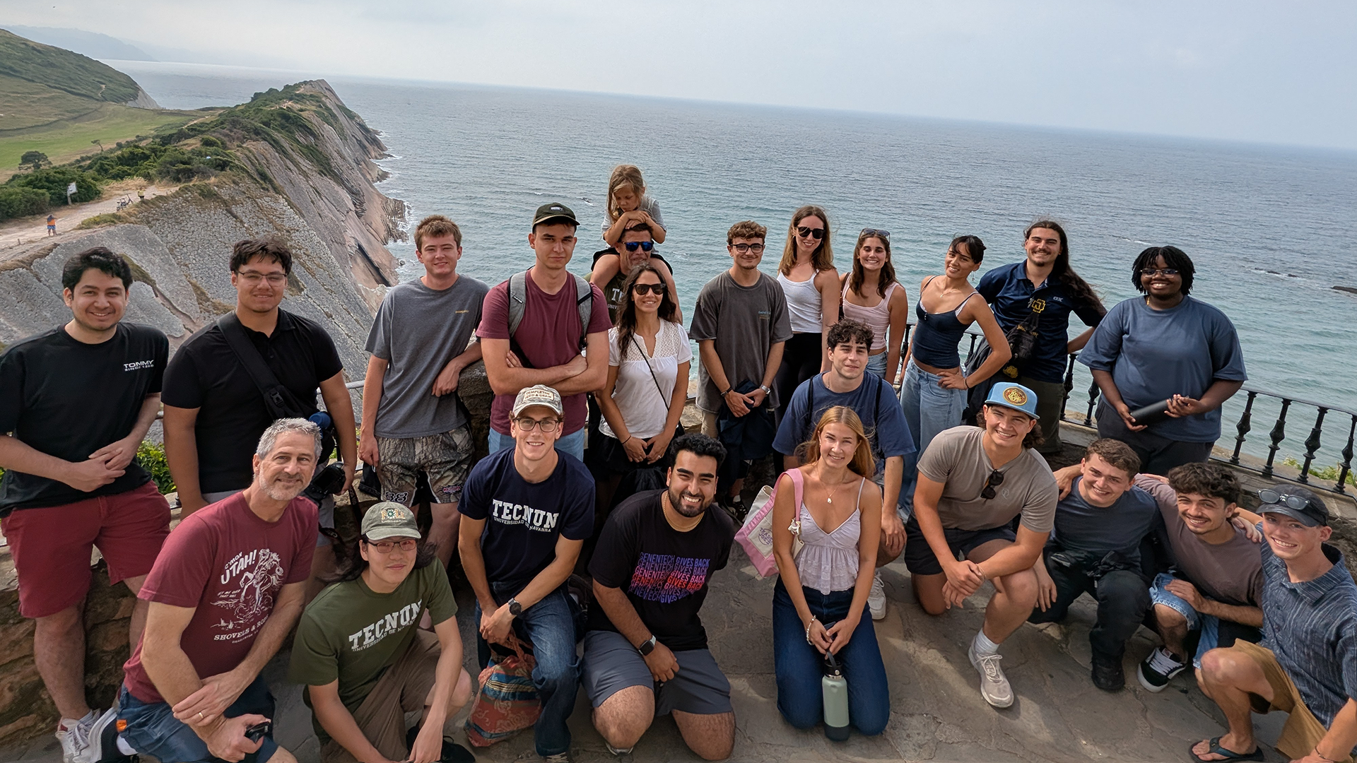 Students gather for group shot while on coastal hike in Spain