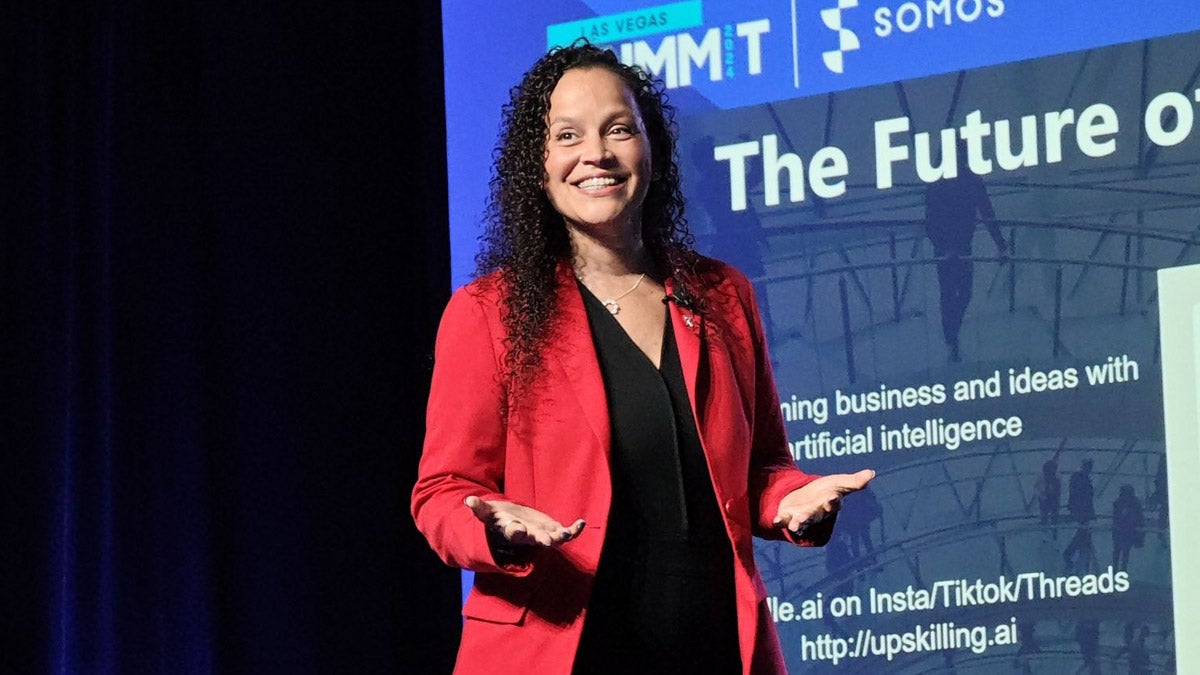 Noelle Russell speaking on stage