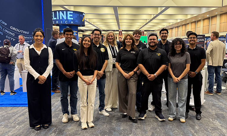 Students gather for a group photo at conference