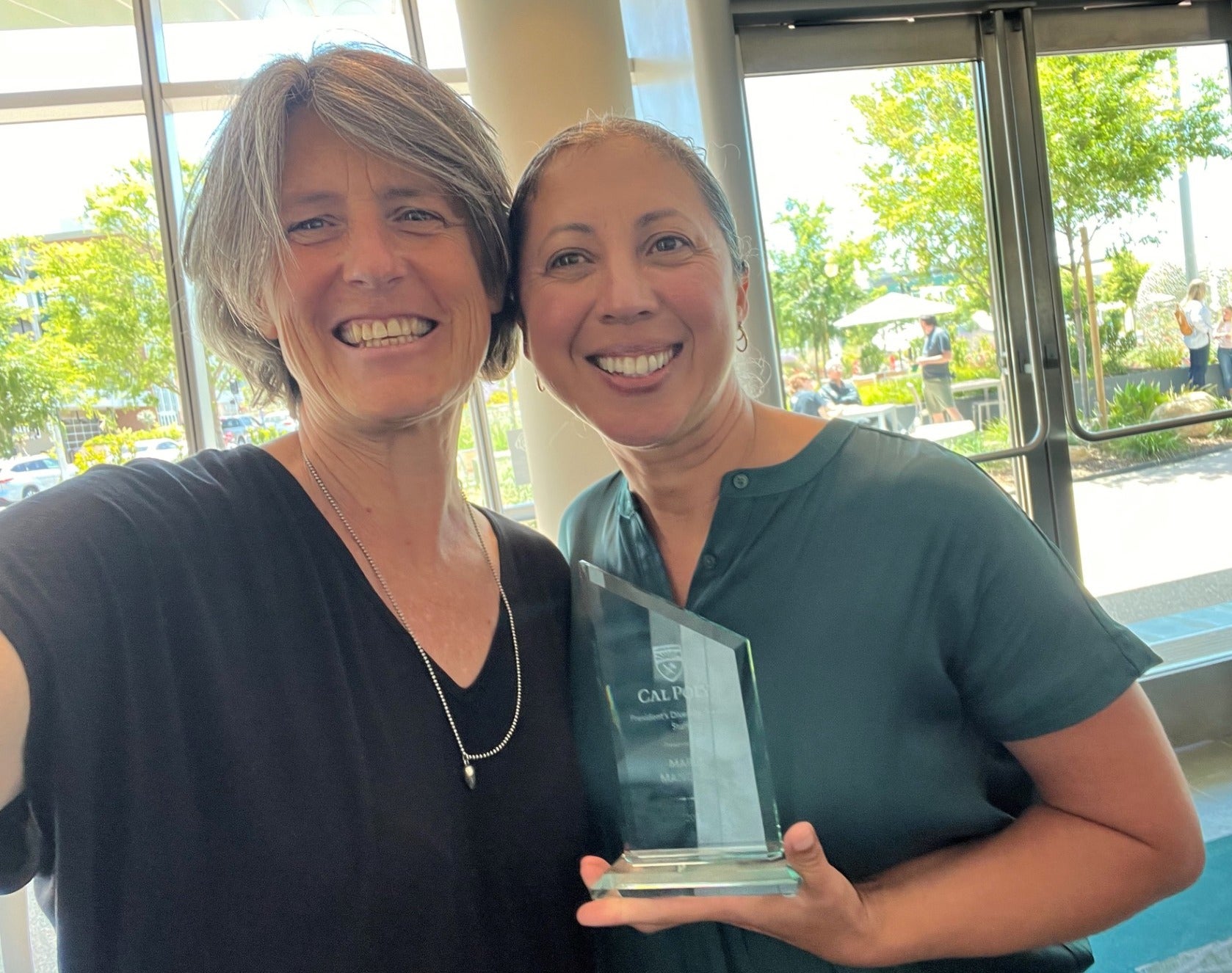 Maria Manzano displays her award