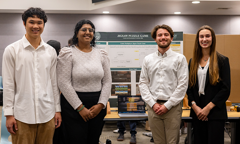 Students present their project poster