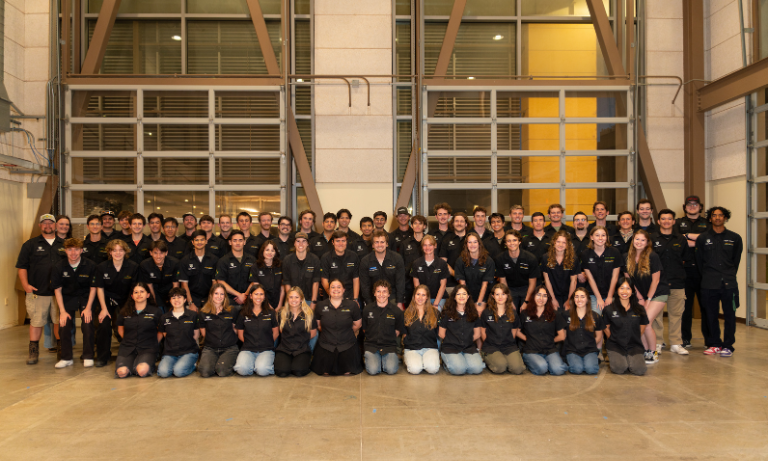 A group photo of shop tech students