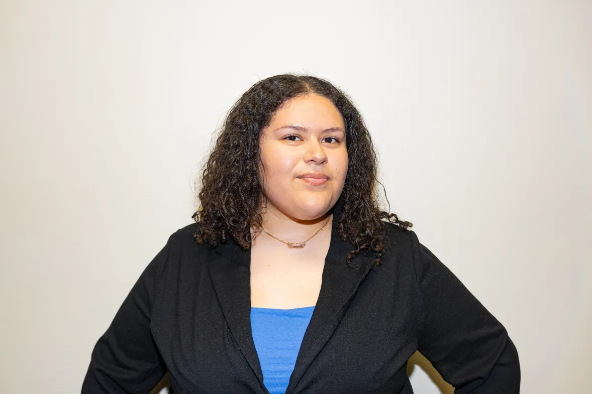 A headshot of a woman