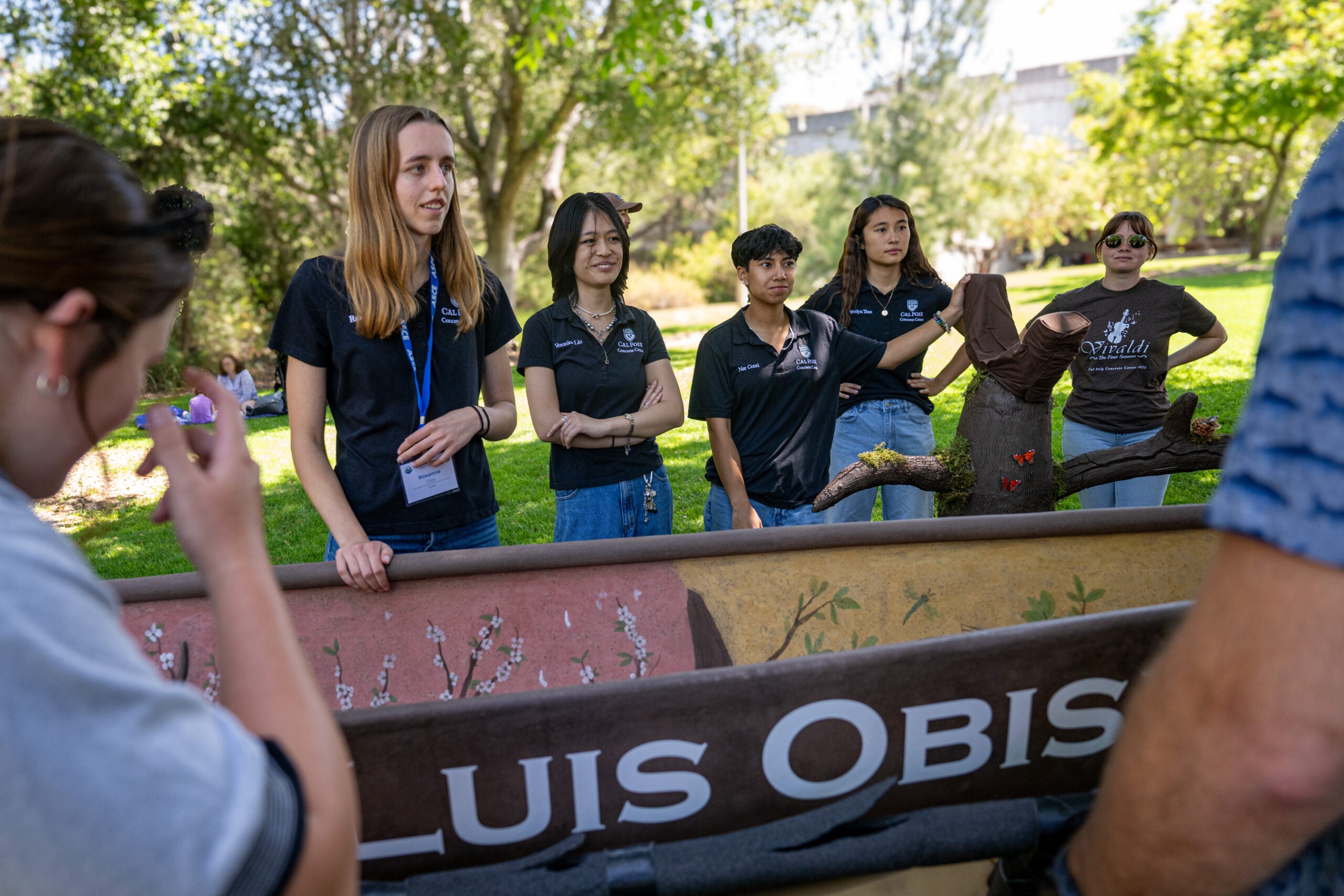 Students display their concrete canoe ahead of race day