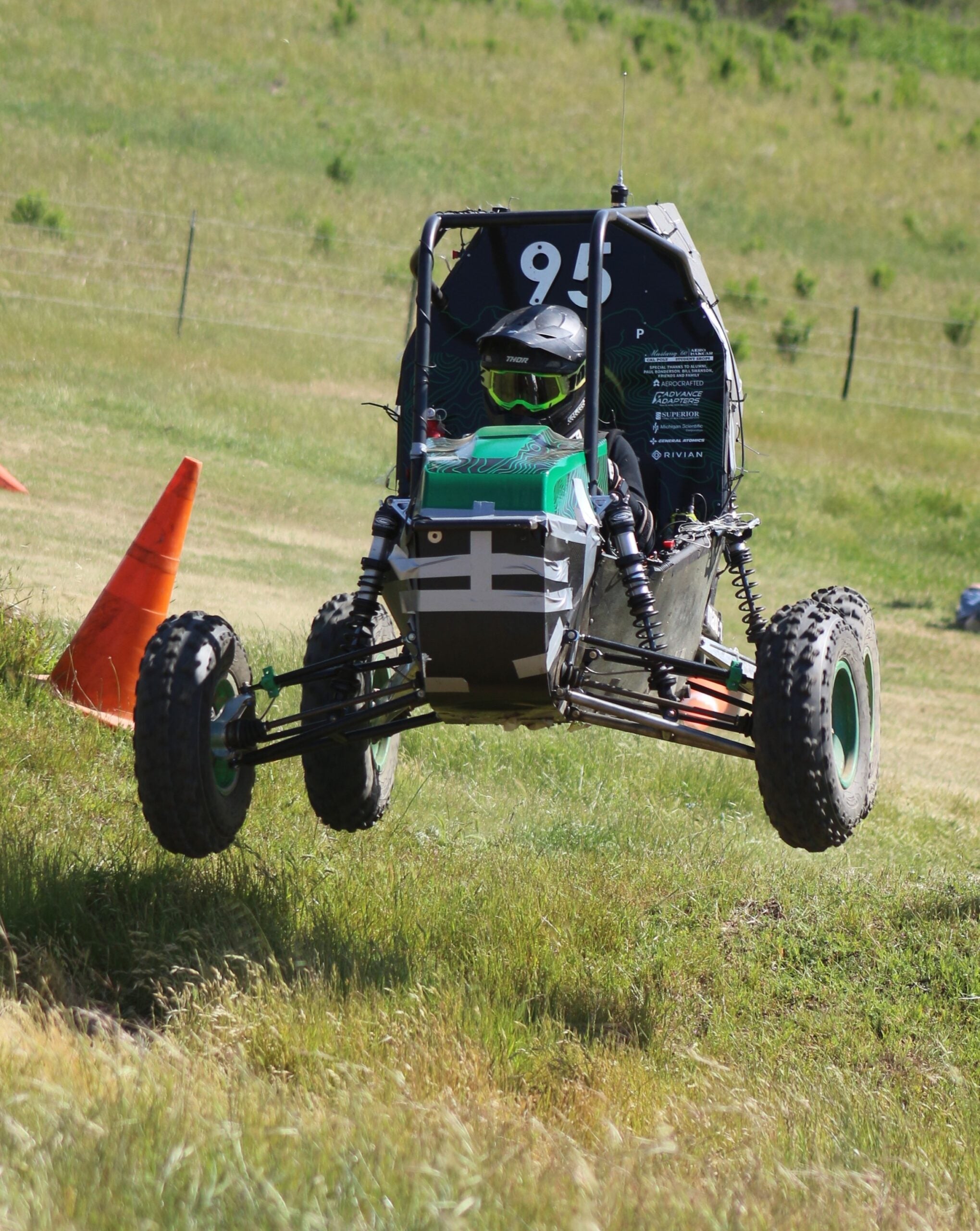 Driver gets airborne in off-road vehicle