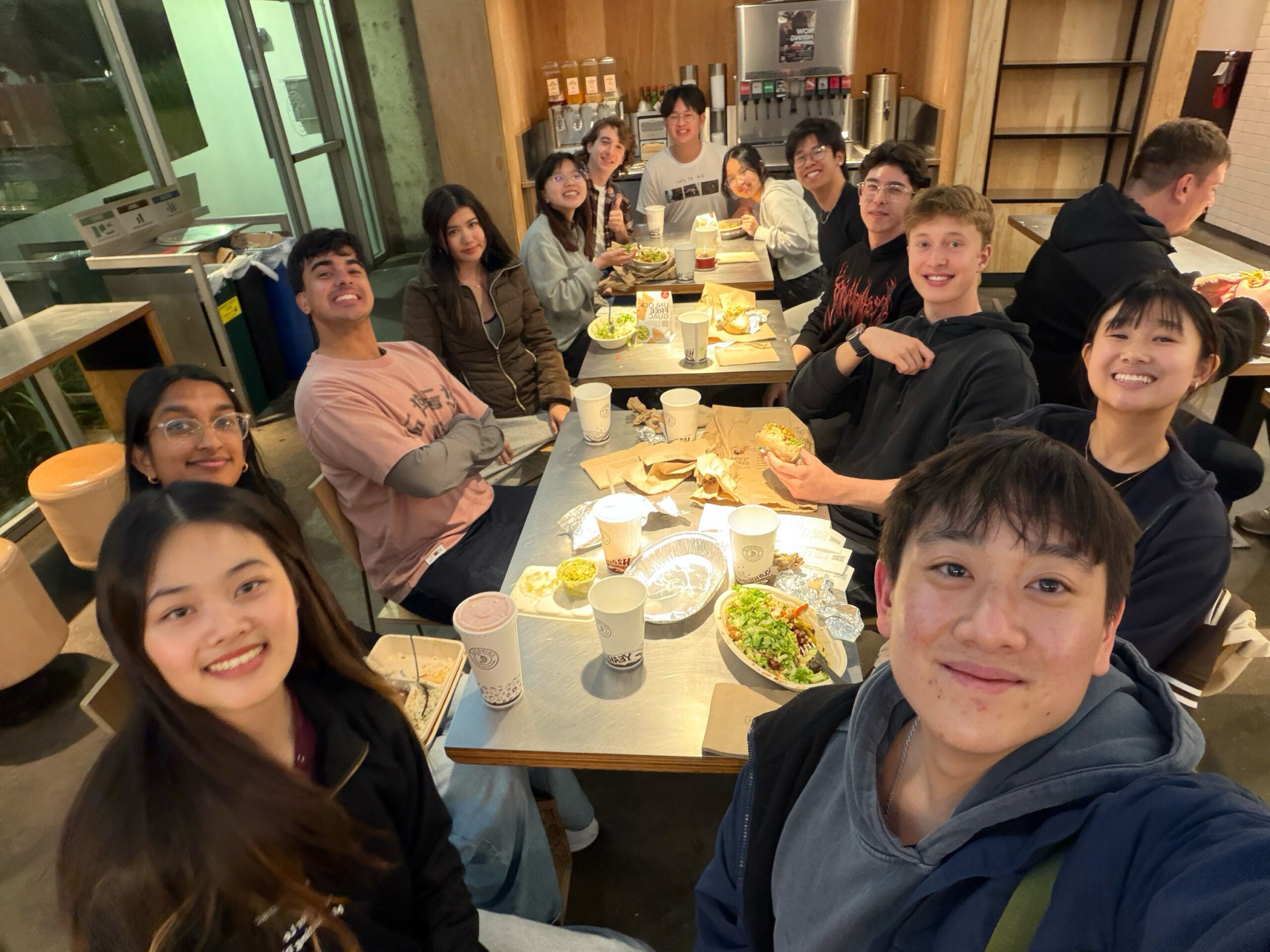 Students gather for an early team-bonding experience at Chipotle 