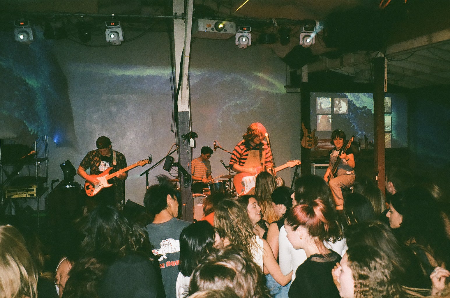 Members of Couch Dog perform a local show