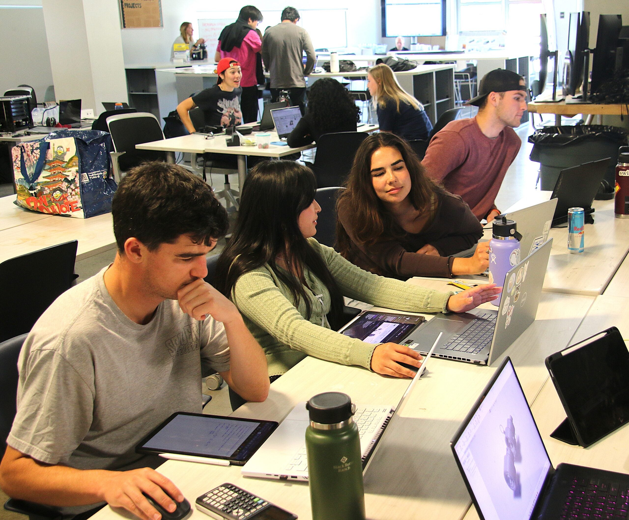 Students work on laptops in the lab