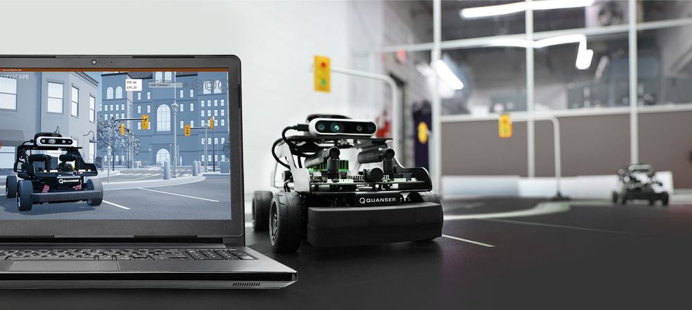 Competition environment including a laptop and simulation car