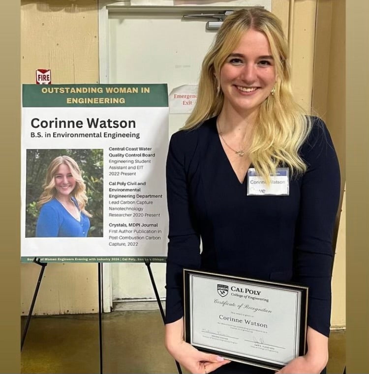 Cal Poly student Corinne Watson posing with her SWE award certificate.