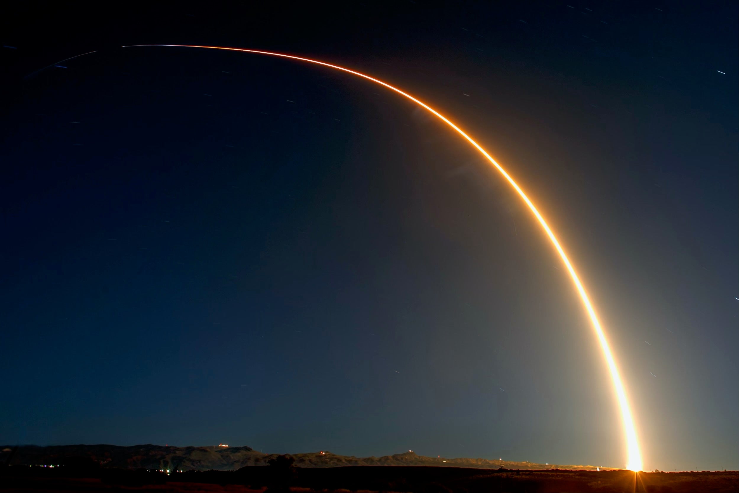 Rocket launches into the night sky