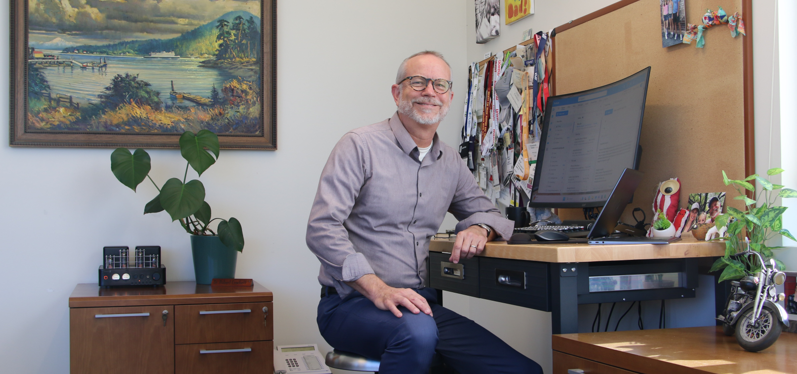 Professor sitting at his office desk