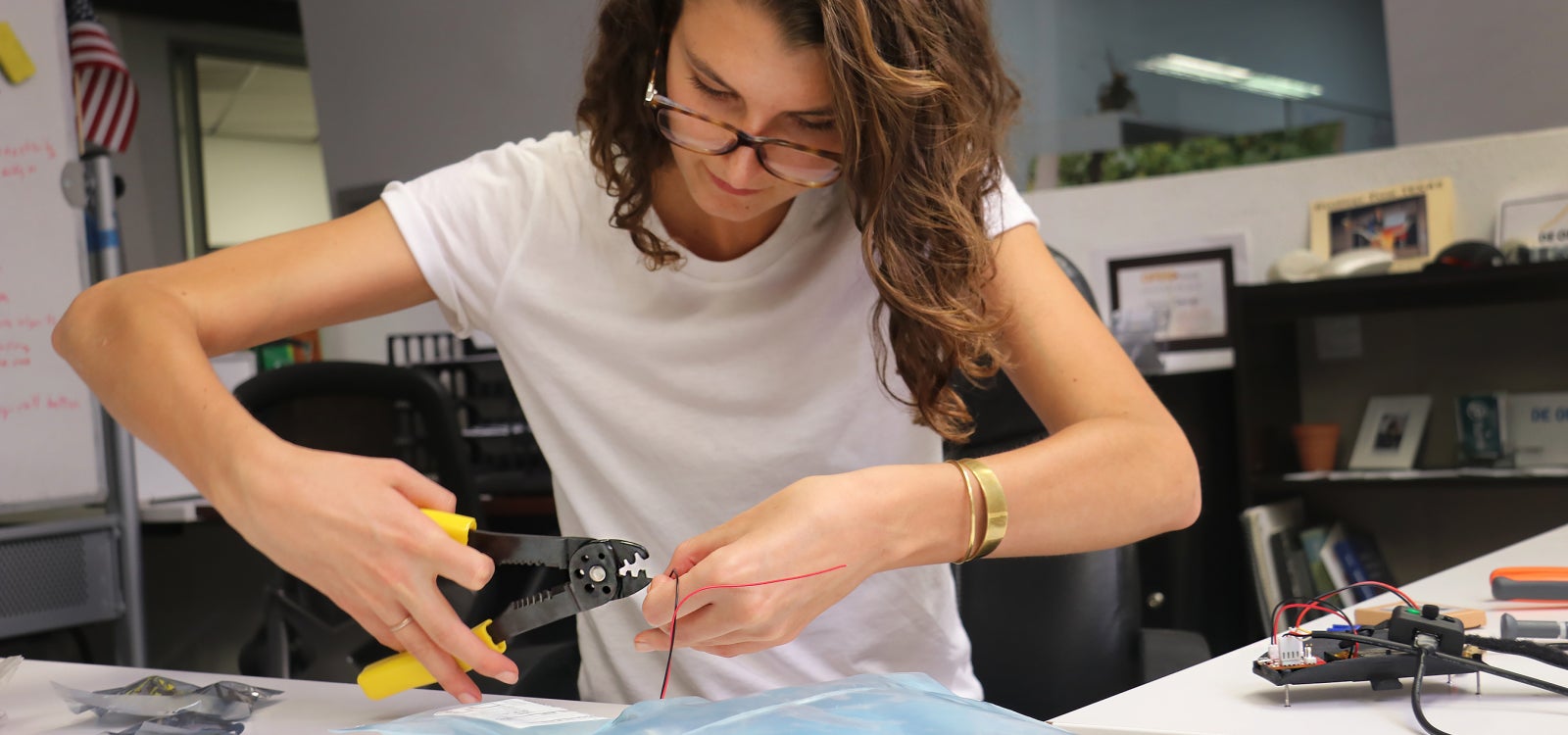 Alumna works on her device to help Parkinson's patients