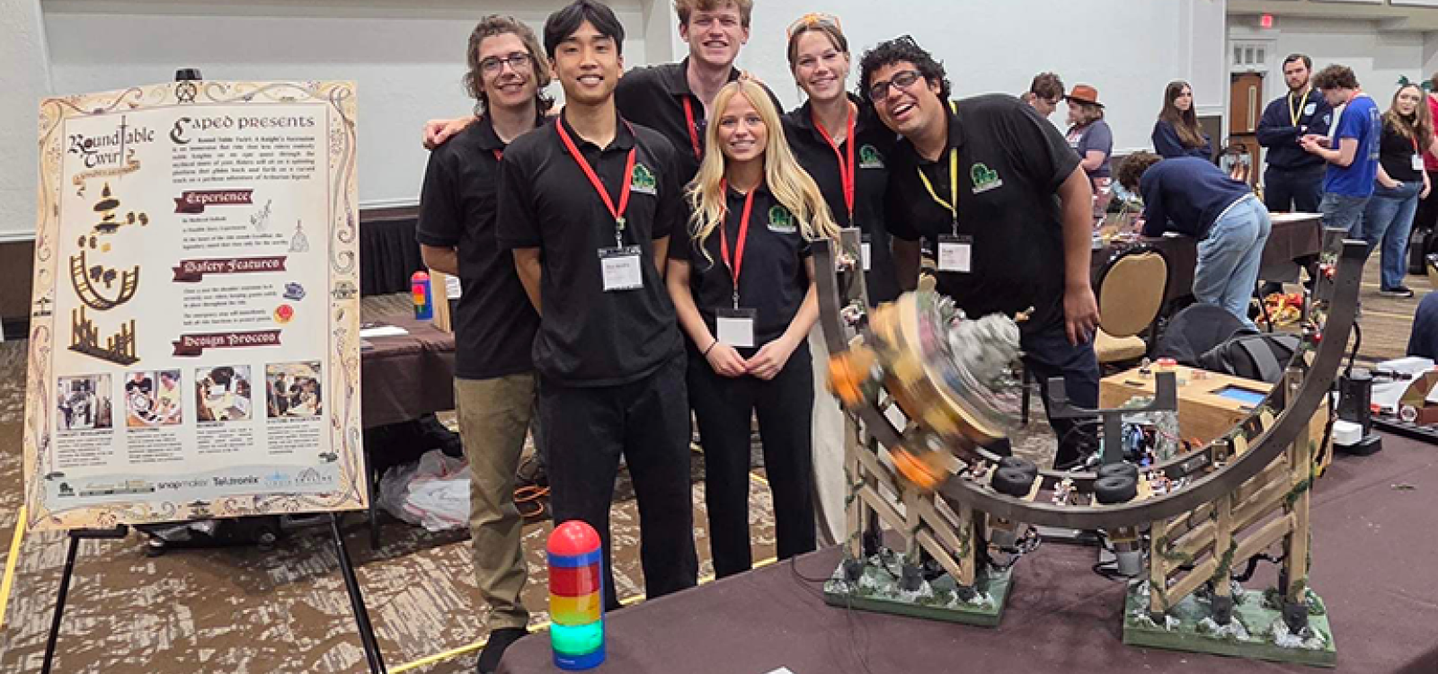 Team members pose with award-winning ride