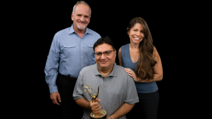 Trio poses for group shot with Emmy statue