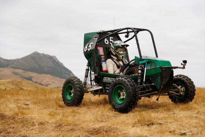 Members of Cal Poly Racing test out their BAJA SAE vehicle at their test course near Cuesta College.
