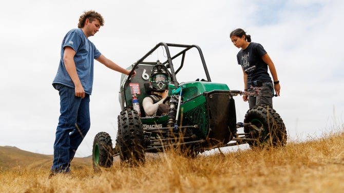 Members of Cal Poly Racing test out their BAJA SAE vehicle at their test course near Cuesta College.