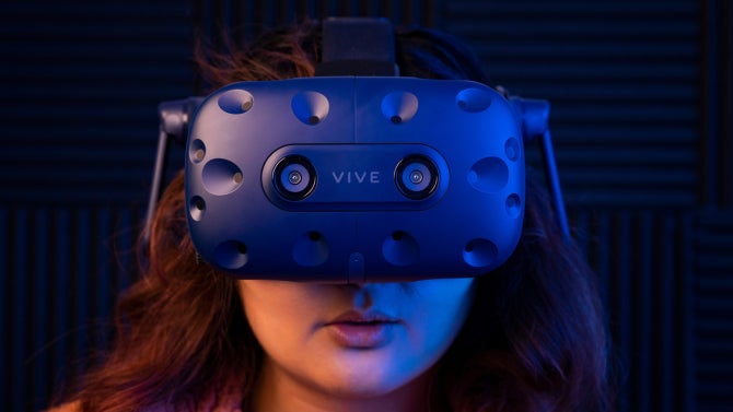 Cal Poly computer science major Zahnae Aquino uses an HTC VIVE headset and controllers to navigate a virtual reality environment that she created with fellow student Josie Grundler, a liberal arts and engineering studies major.