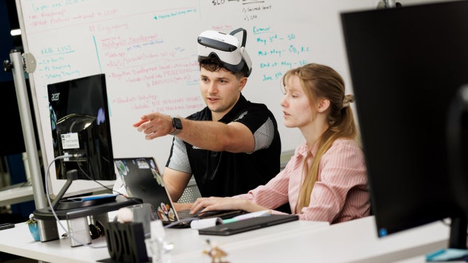 ODIN Diagnostics co-founders Marina Zellers, (BMED grad student) and Connor Heffler (Economics ’24 and former student athlete), at the Cal Poly CIE HotHouse. Their startup uses VR to diagnose concussions.