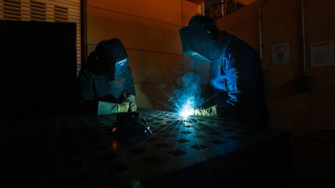 Cal Poly students practice metalworking in the Mustang ’60 Machine Shop.