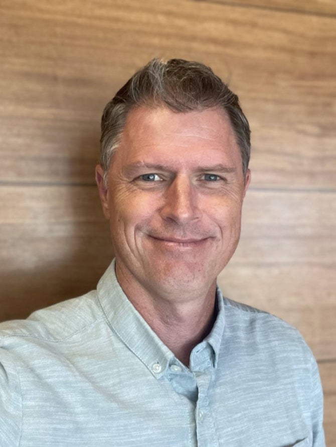headshot of Eric Mehiel