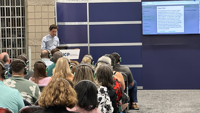 Student presenting in front of an audience