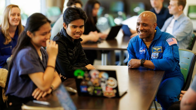 NASA astronaut and Cal Poly alumnus Victor Glover talks with Cal Poly Engineering student groups working on projects designing exercise equipment for astronauts in zero-gravity and a Mars Rover for the Mars Society’s University Rover Challenge.