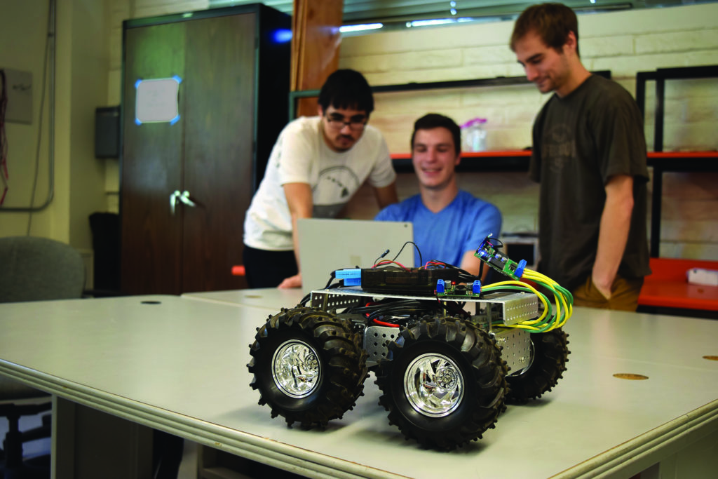 Students working with GPS robot