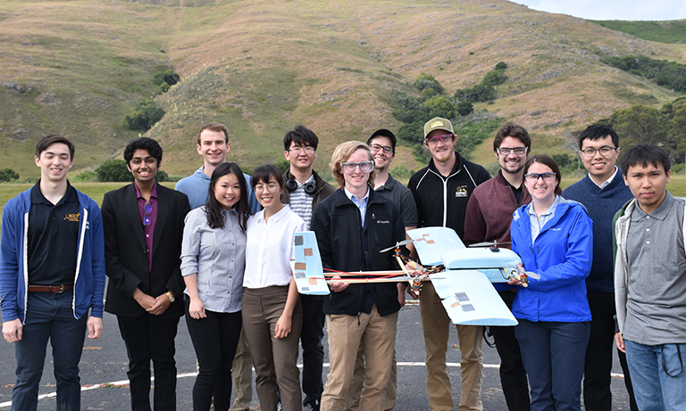 Group of students with autonomous vehicle