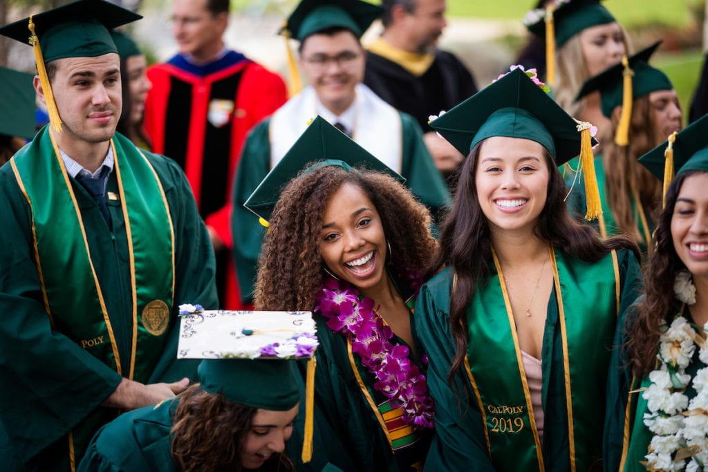 Group of students smiling during Commencement ceremony