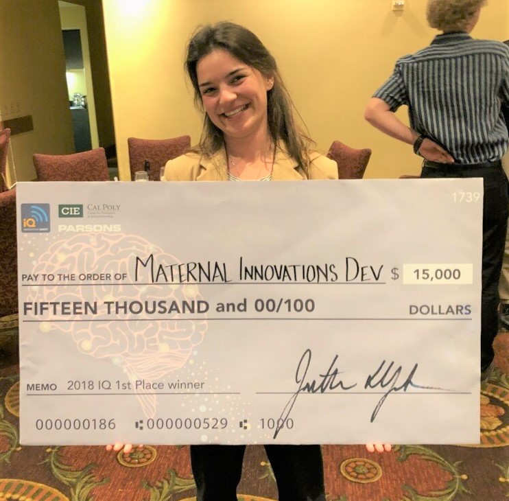 Woman holding large check