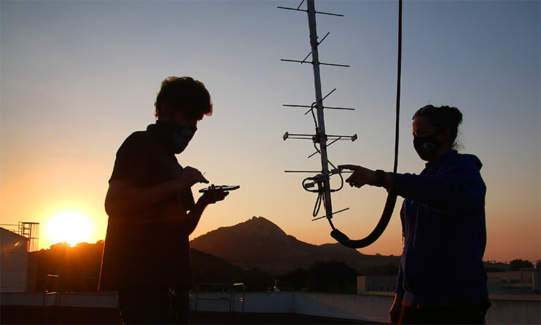 Students working on antenna