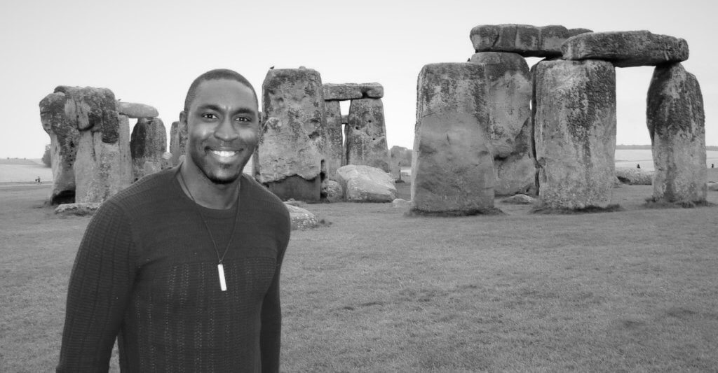 Karl Ivory, a Cal Poly graduate, poses at Stonehenge