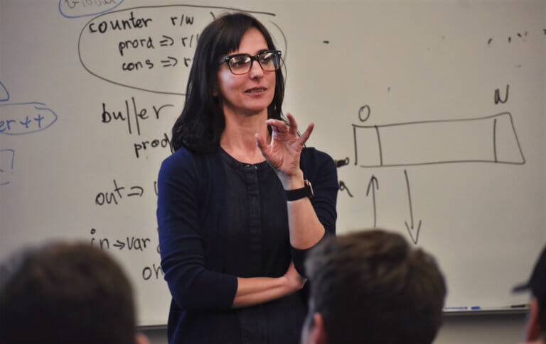 Maria Pantoja teaches a class in the Computer Science and Software Engineering Department. Female faculty members are underrepresented in engineering programs nationwide.