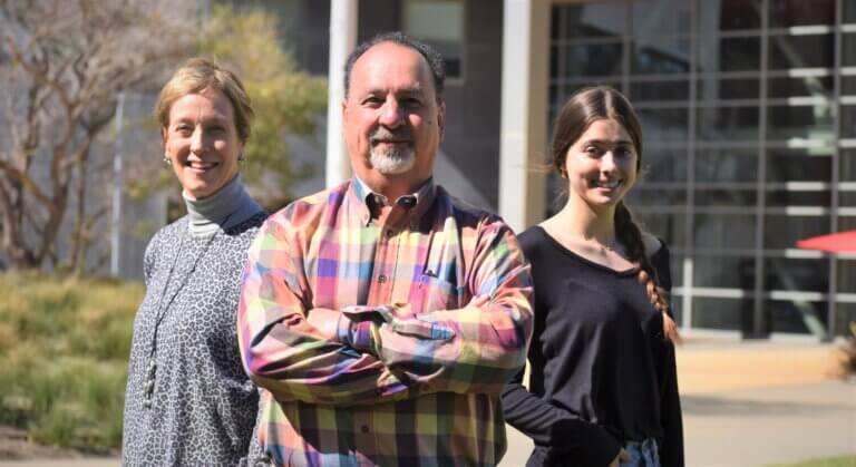 Steve Deas, center, has created a scholarship where a student will pay 1980 tuition prices.