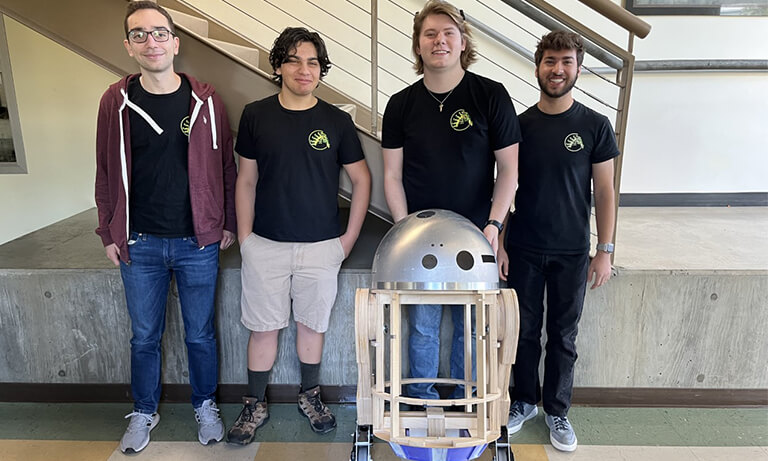 Four Robotics Club members