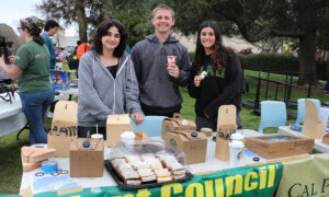 Students handing out pastries