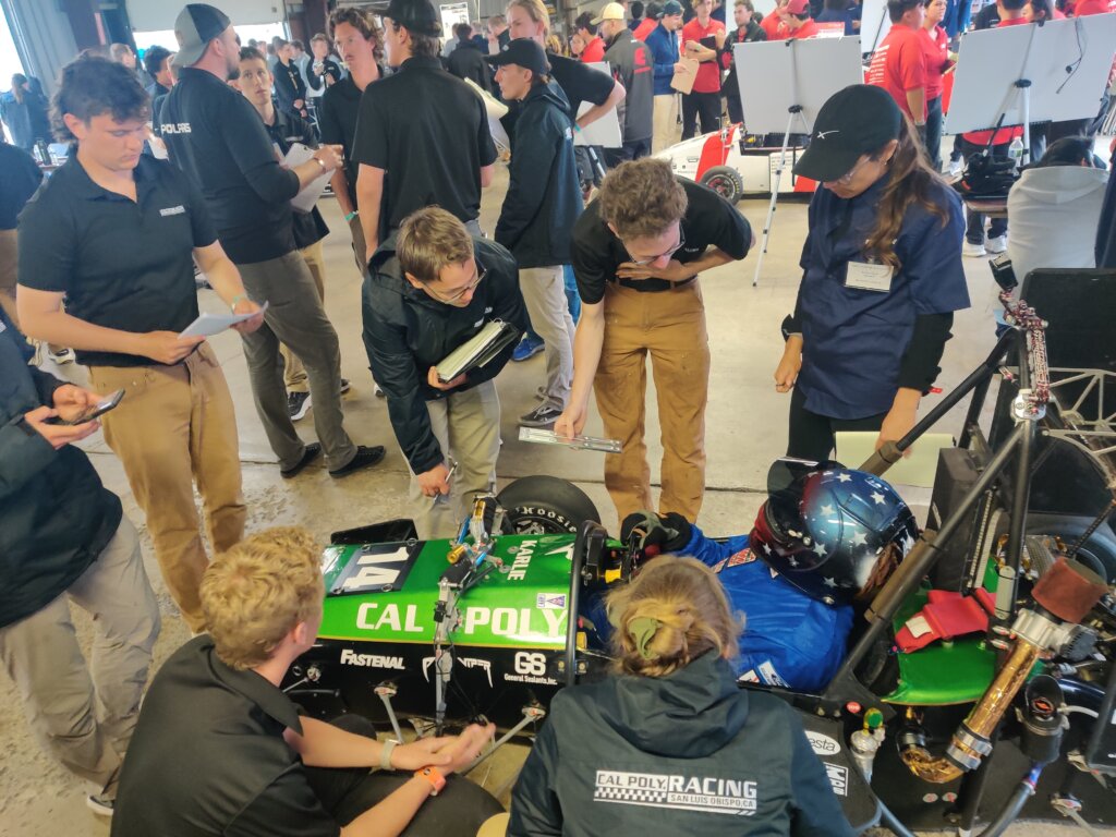 Judges inspect Cal Poly Racing's combustion car