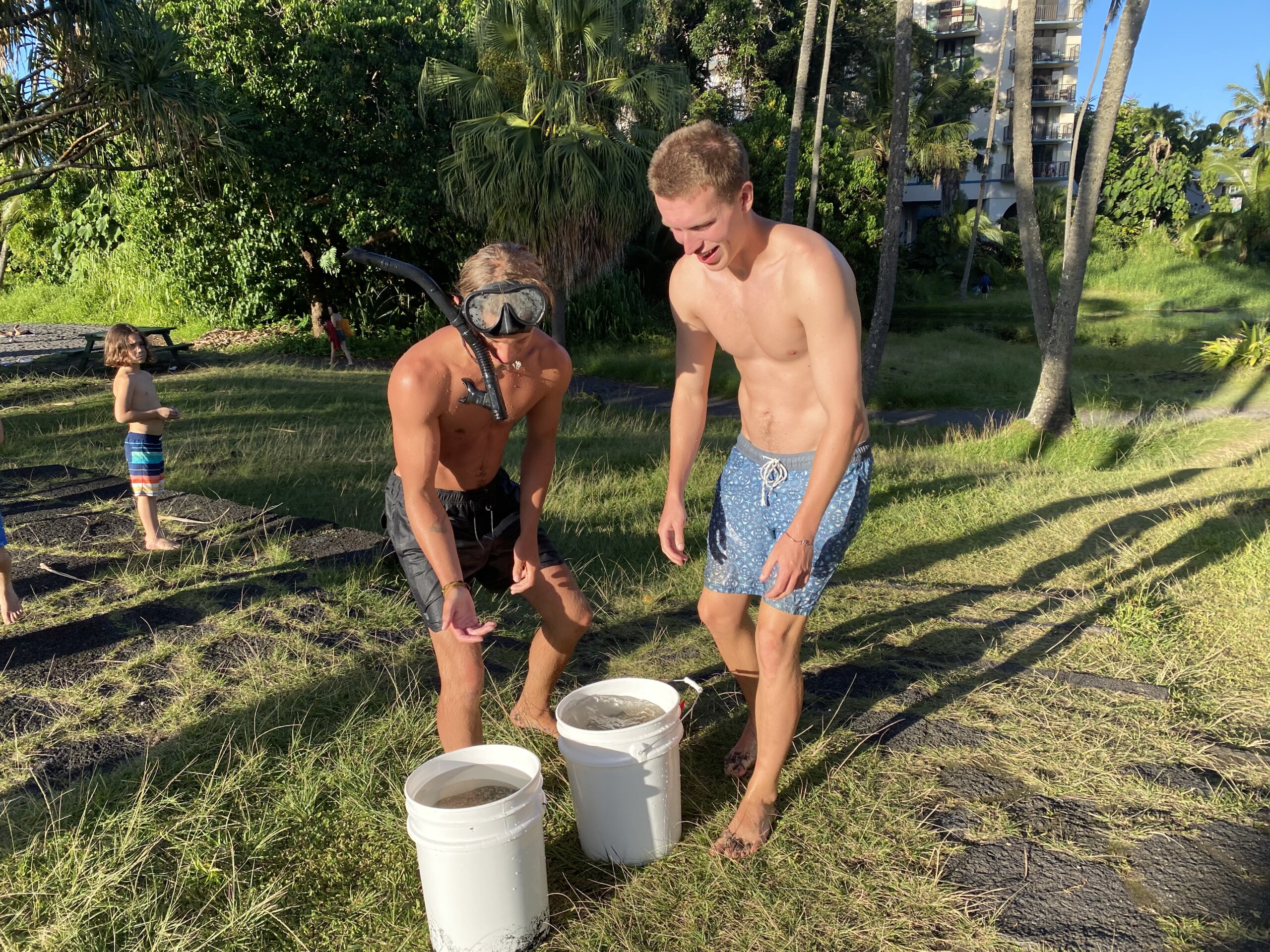 Cal Poly students collect ocean water for research on the Big Island of Hawaii