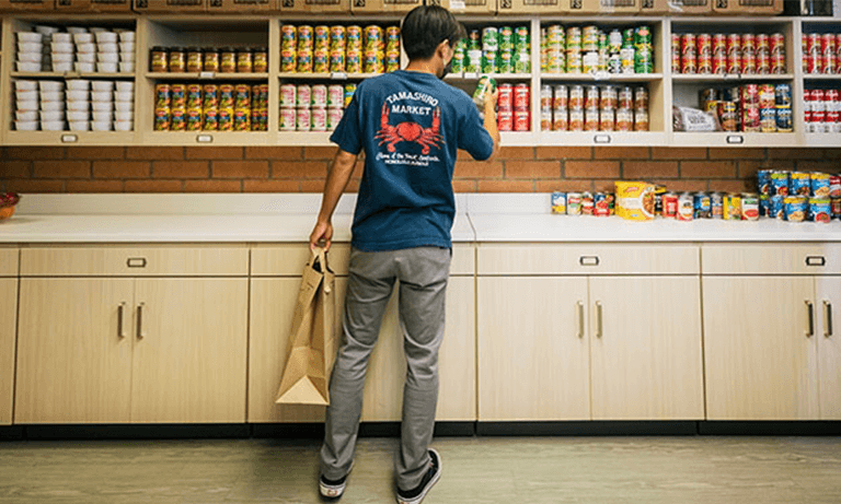 A student getting food at the Cal Poly Food Pantry