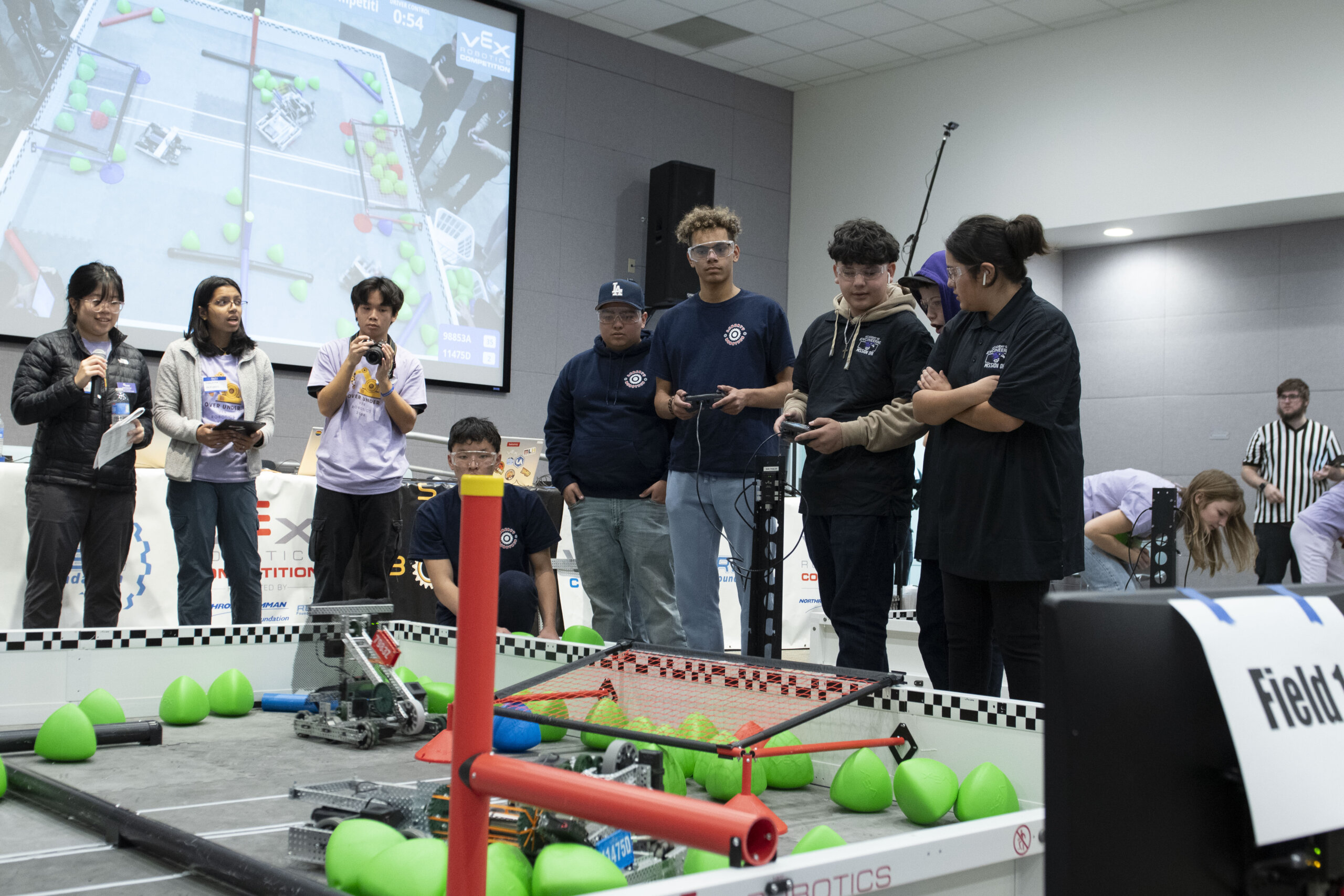High school and middle school students compete with their robots in a competition hosted by Cal Poly SWE