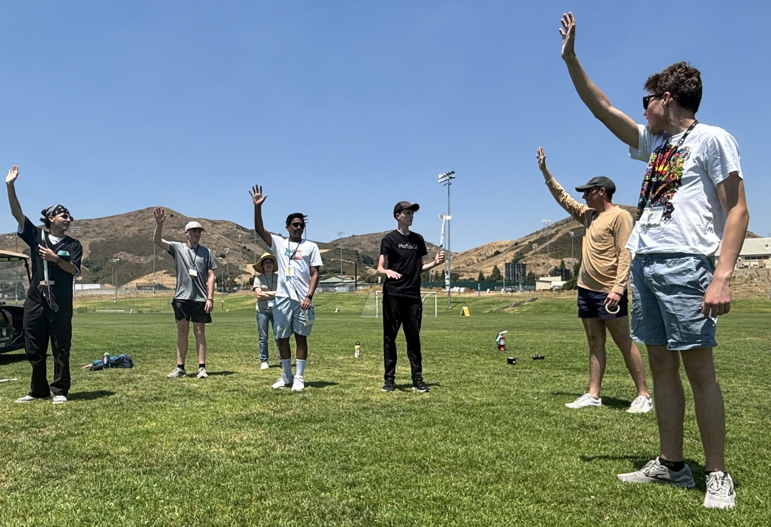 EPIC student assistant gives campers an impromptu lesson on aerodynamics using the wind