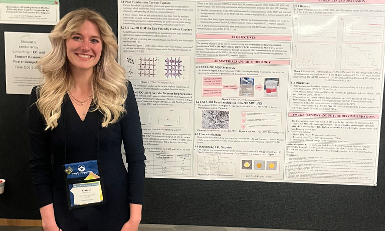 A Cal Poly student standing in front of her poster at the 2024 Senior Project Expo.