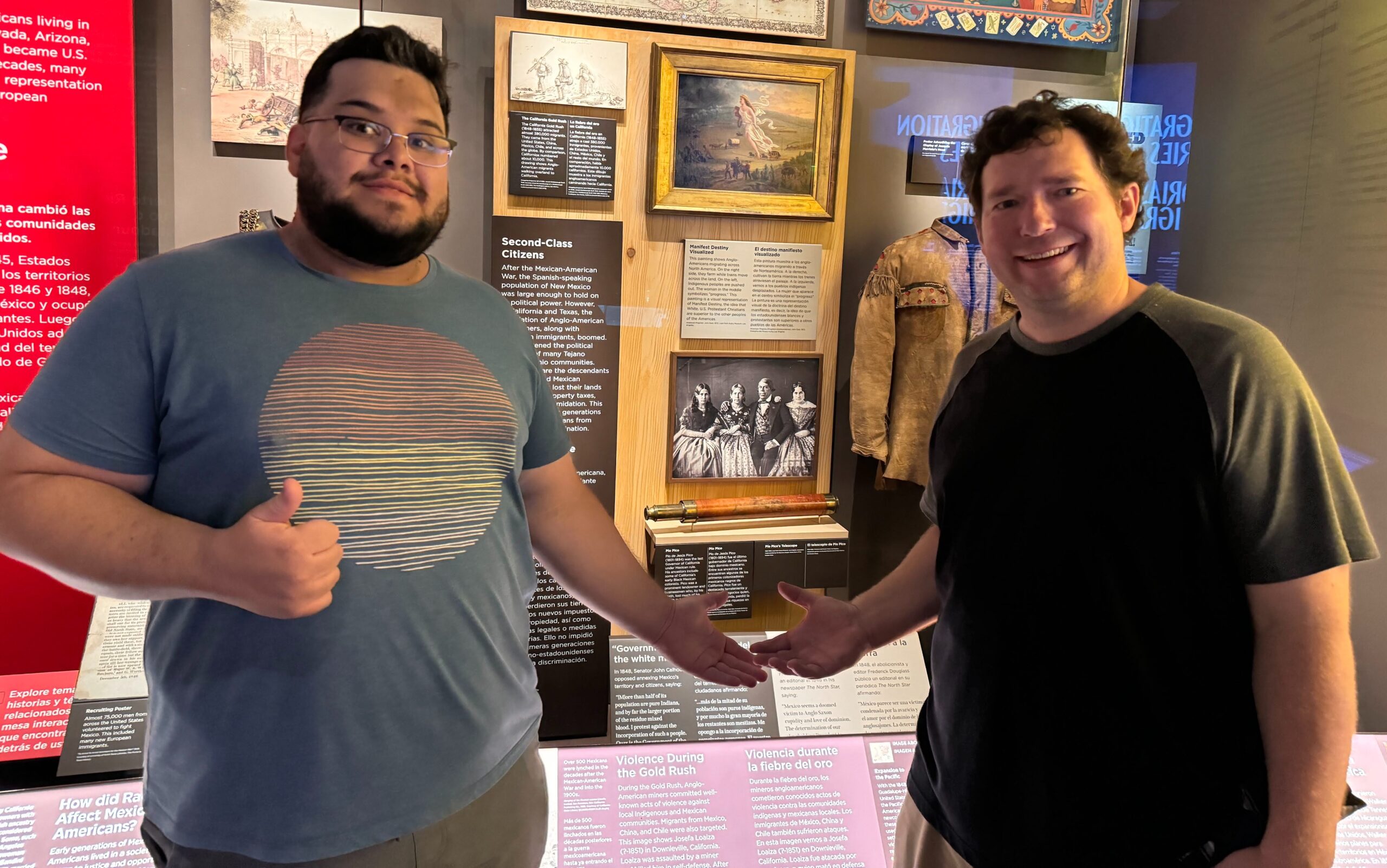 Student and professor visit museum display