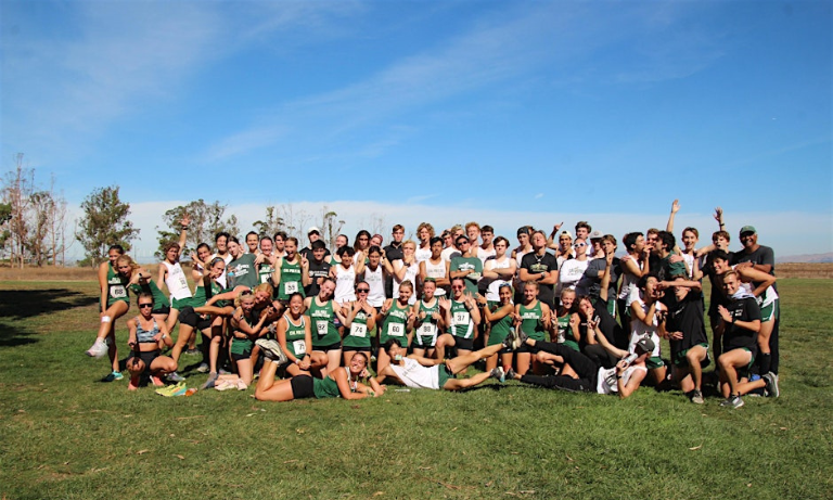 A group photo of people in track uniforms.